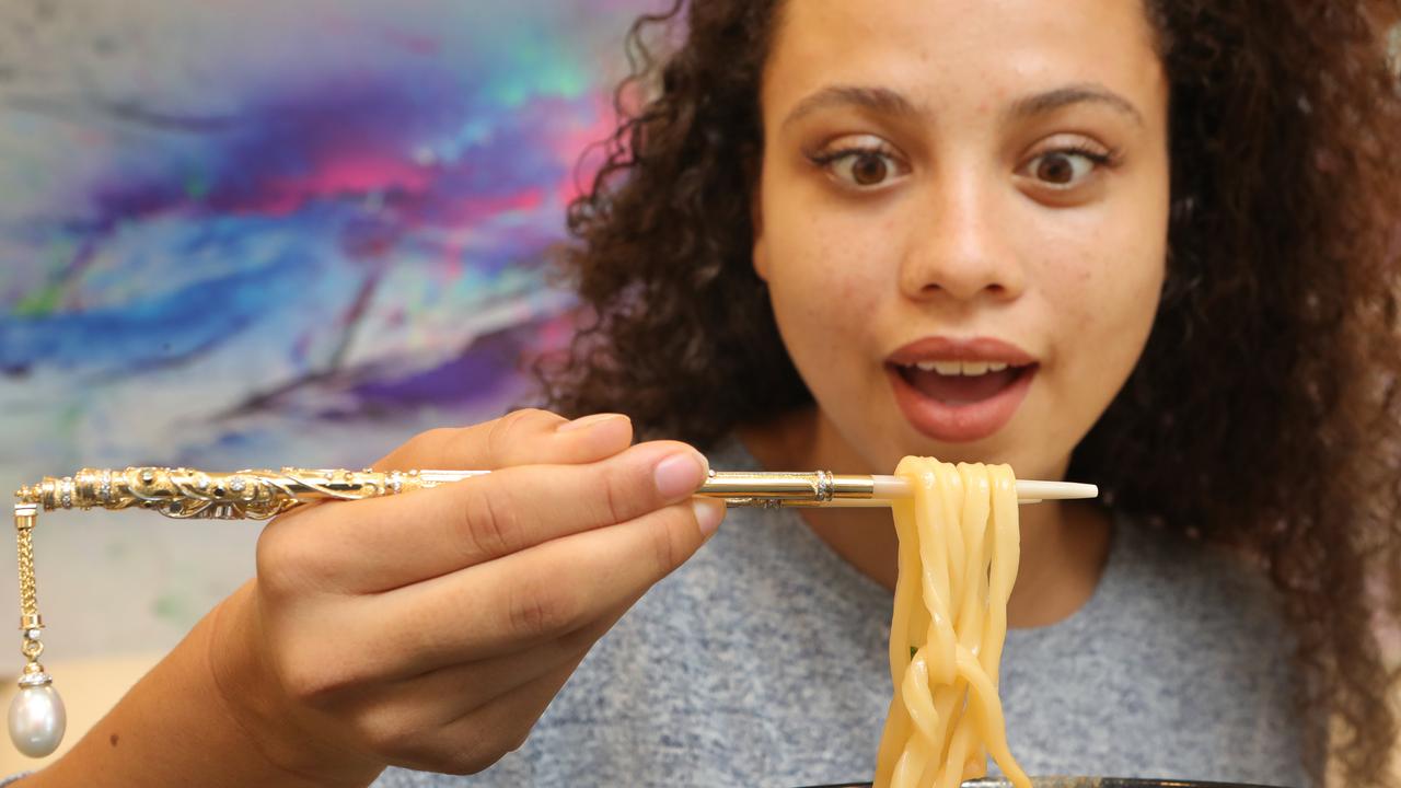 Most expensive chopsticks, A Gold Coast jeweller has designed the perfect  tool for extravagant foodies. The 18 carat gold chopsticks are embellished  with diamonds, ebony and pearls, By 7NEWS Gold Coast