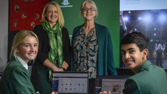 Westminster has one of the lowest student to teacher ratios in the state. Westminster director of teaching Angela Phillips, director of learning Andrea Sherwood with students, Siobn and Ryan, both 16. Picture: NCA NewsWire / Roy VanDerVegt