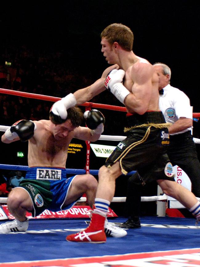 Australia's Michael Katsidis punches Luton's Graham Earl (left) during an interim WBO world lightweight title fight at Wembley Arena. Picture: Sean Dempsey/Getty Images