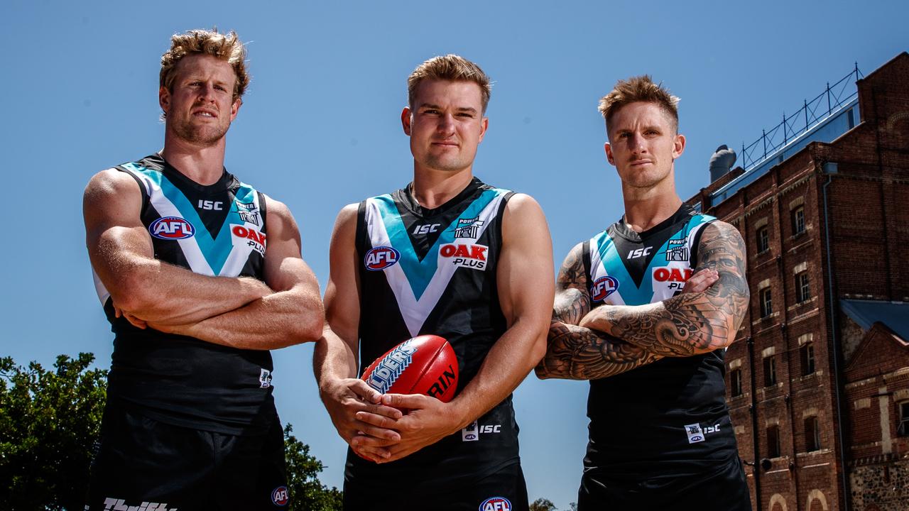 Port Adelaide vice-captain Hamish Hartlett (right) with new co-captains Tom Jonas and Ollie Wines. Picture: MATT TURNER.