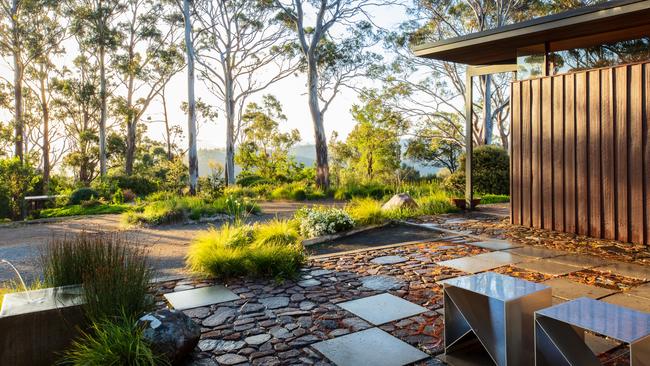 The soil is rocky dolerite, difficult to garden, but a good source of stone for garden projects. Picture: Claire Takacs