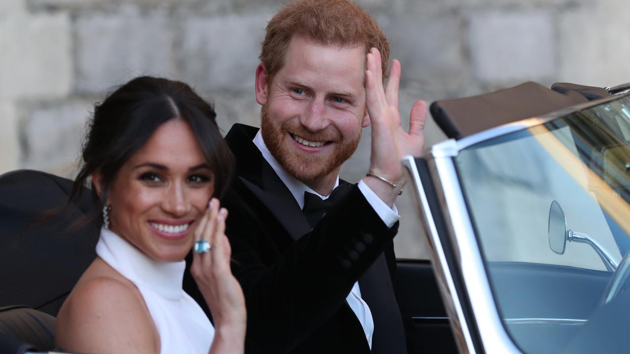 Newlyweds Meghan and Harry with Meghan wearing Diana’s stunning aquamarine ring. Picture: Steve Parsons/WPA Pool/Getty Images.