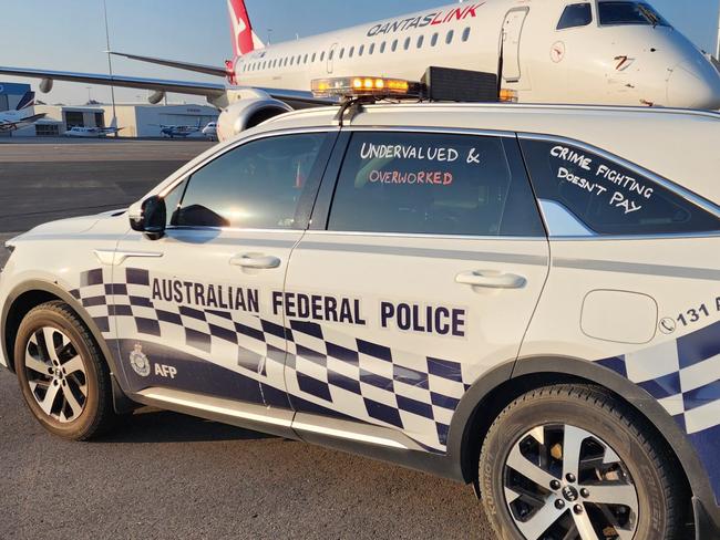 The Australian Federal Police Association is considering walk-outs at federal sites including airports and Parliament House as a part of its industrial action in a pay dispute with the Albanese government. Picture: AFPA