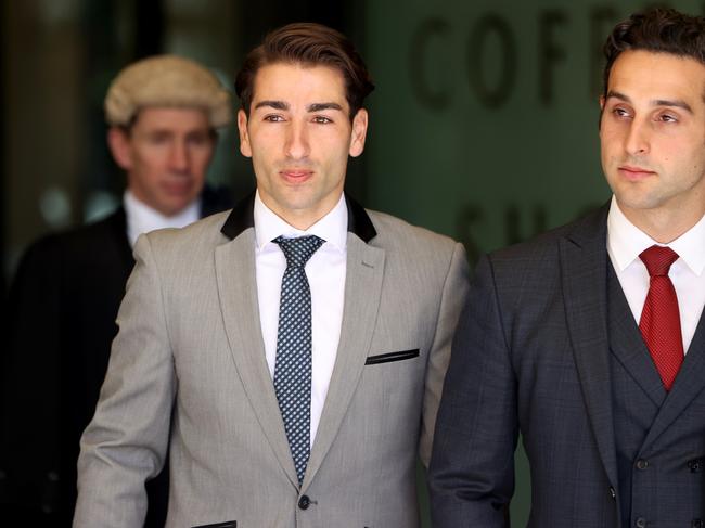 Mohammad Naji pictured (centre) with a member of his defence team. Picture: NCA NewsWire / Damian Shaw