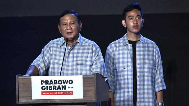 Presidential candidate and Indonesia’s Defence Minister Prabowo Subianto, left, with vice-presidential candidate Gibran Rakabuming Raka in Jakarta on Wednesday night. Picture: AFP