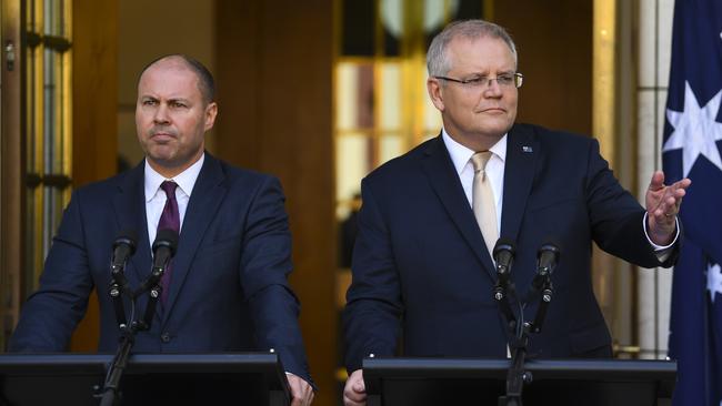 Scott Morrison and former Australian Treasurer Josh Frydenberg. Picture: AAP Image/Lukas Coch