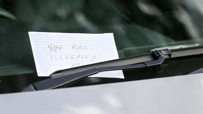 Someone placed a note on the front windscreen in Olympiad Cres. Picture: Tim Carrafa