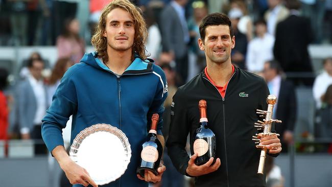 Novak Djokovic of Serbia with the winners trophy after defeating Stefanos Tsitsipas of Greece in the final during day nine of the Mutua Madrid Open at La Caja Magica on May 12, 2019 in Madrid, Spain. Picture: Getty Images.