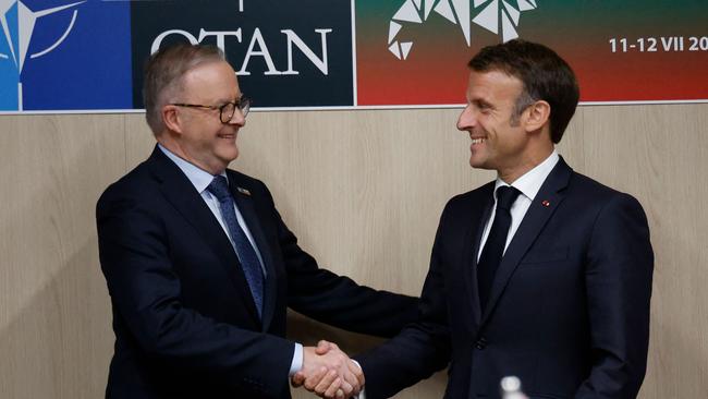 Mr Albanese shook hands with French President Emmanuel Macron. Picture: Ludovic MARIN / AFP