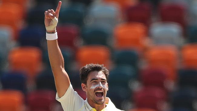 Australia's Mitchell Starc celebrate's his wicket of Sri Lanka's Dinesh Chandimal during Day 4 of the second Test match between Australia and Sri Lanka at Manuka oval, Canberra. Picture. Phil Hillyard