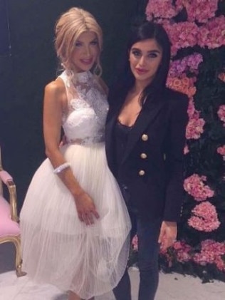 Kat Mehajer started the night in a sheer white number.