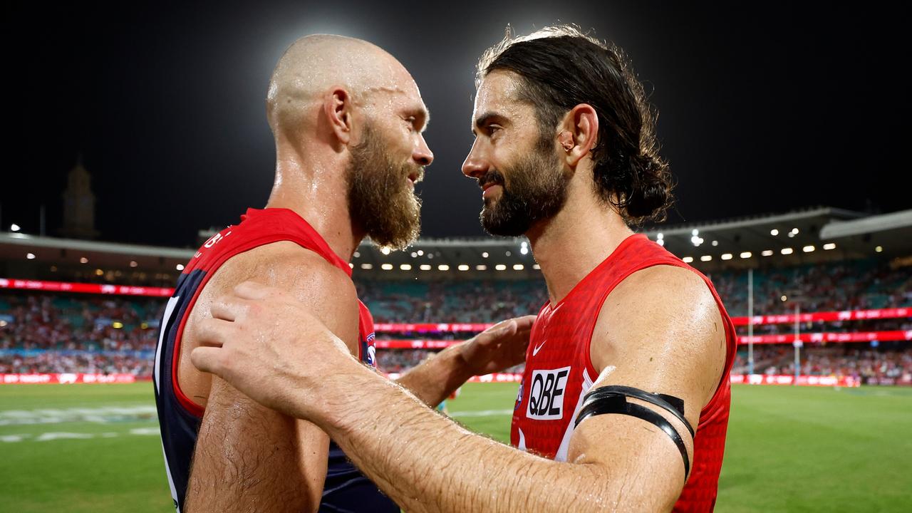 Max Gawn and Brodie Grundy embrace after the game. Photo: Michael Willson/AFL Photos via Getty Images
