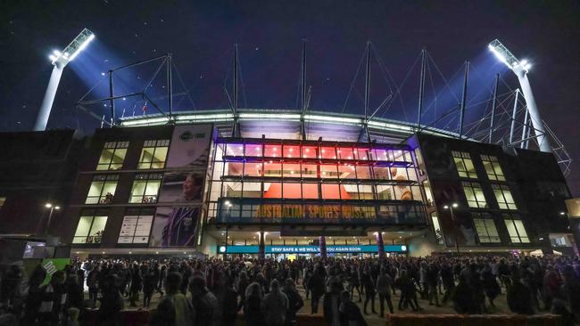 AFL. Anzac Day match Collingwood v Essendon at the MCG. Fans leave the MCG after the game. Picture: Ian Currie