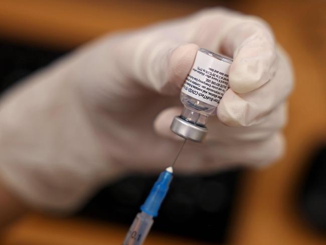 People are urged to get vaccinated against Covid-19. Picture: Menahem Kahana/AFP