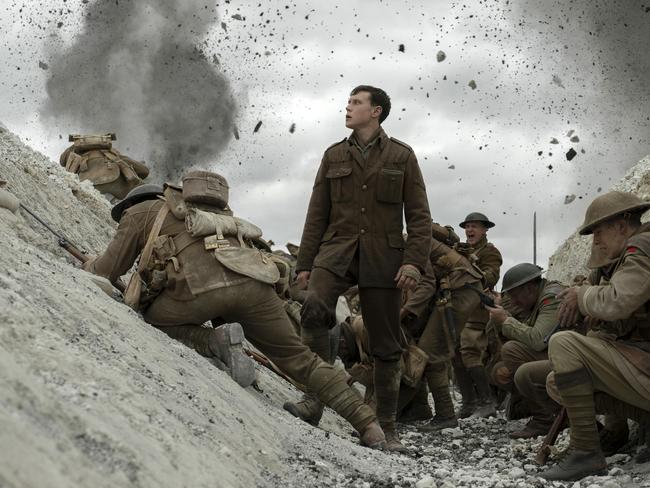 George MacKay, center, in a scene from 1917, directed by Sam Mendes.