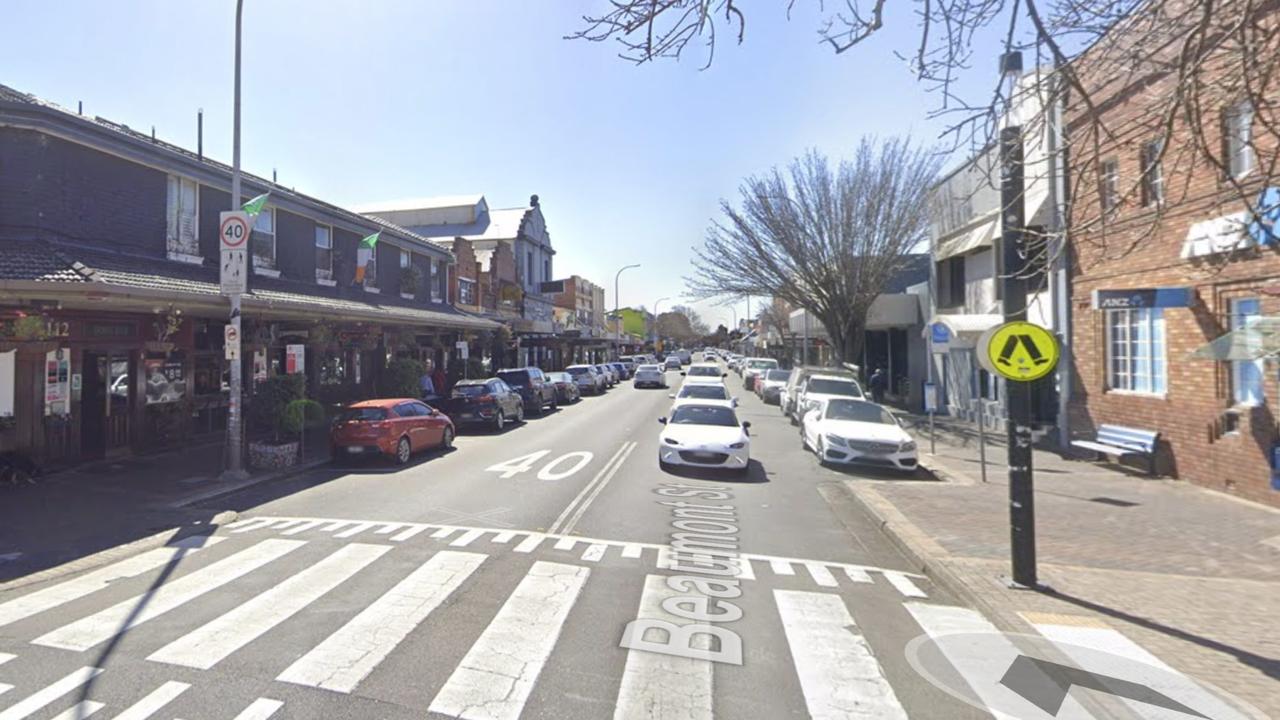 A man has been charged with displaying a Nazi symbol after a shopfront was allegedly graffitied in Hamilton, NSW.