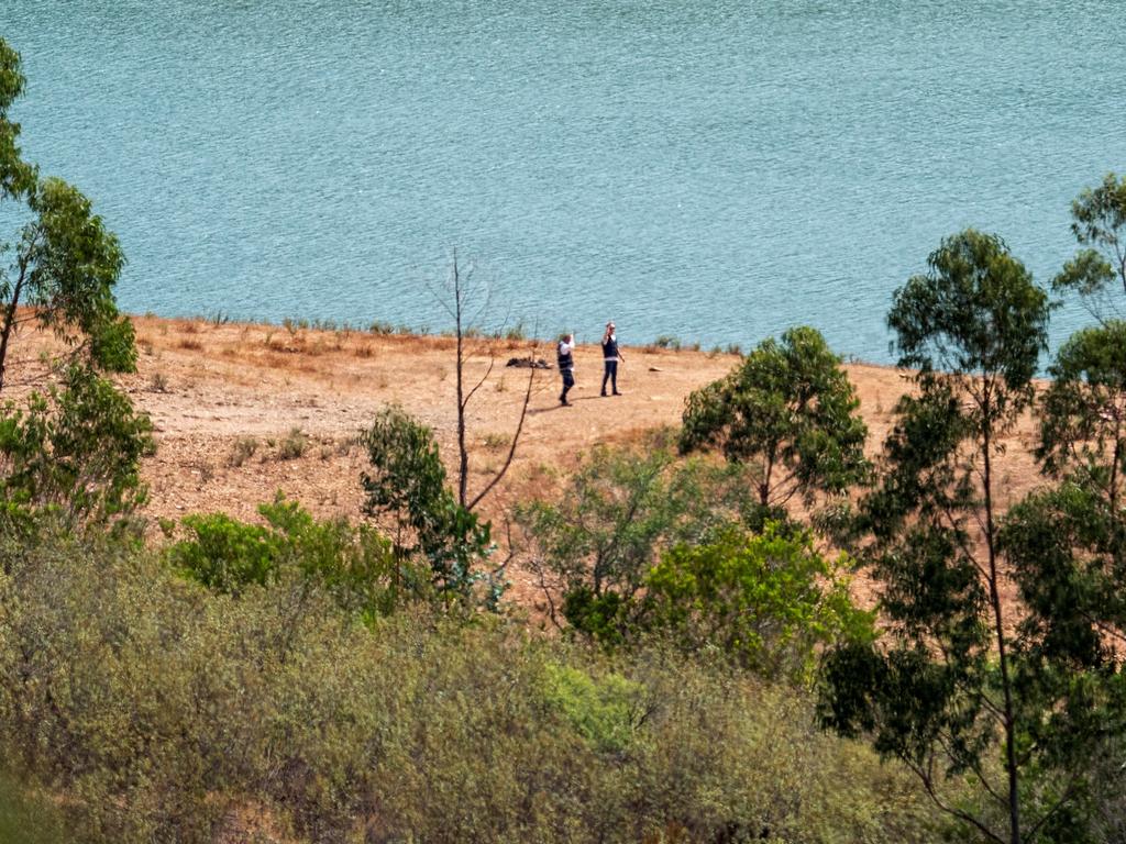 Officers at the reservoir near Silves, Portugal, where a new search for Madeleine McCann is set to take place. Picture: Reuters