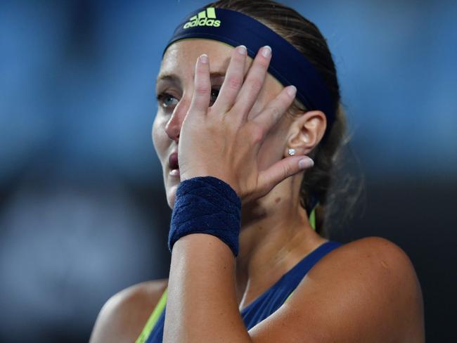 France's Kristina Mladenovic reacts during their women's singles first round match against Romania's Ana Bogdan on day two of the Australian Open tennis tournament in Melbourne on January 16, 2018. / AFP PHOTO / SAEED KHAN / -- IMAGE RESTRICTED TO EDITORIAL USE - STRICTLY NO COMMERCIAL USE --