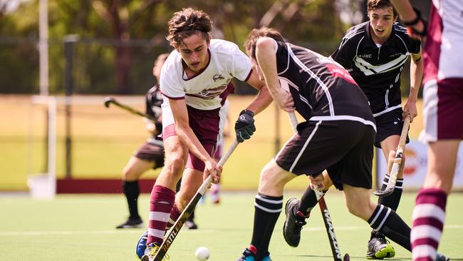 Paxton Silby controls play against Adelaide Uni. Picture: MATT LOXTON