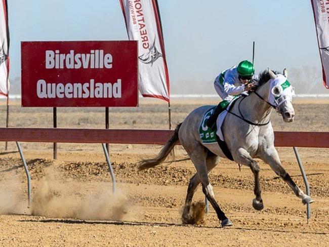 Jockey Emily Finnegan rides the Brook family owned Neodium to win race 6, the TAB Birdsville Cup at the Birdsville races in outback Queensland. Picture: Birdsville Races