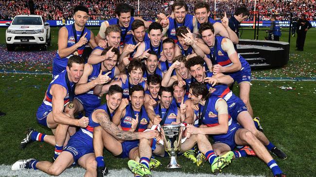 Bob Murphy walks away as Bulldogs celebrate the 2016 premiership.