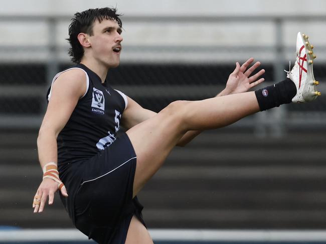 Liam McMahon kicks a goal for Carlton. Picture: Darrian Traynor/AFL Photos