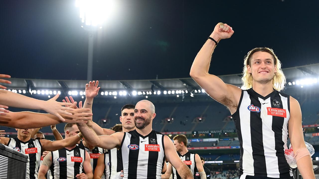 MELBOURNE, AUSTRALIA – MAY 14: Darcy Moore of the Magpies leads his team off the field after winning the round nine AFL match between Collingwood Magpies and Greater Western Sydney Giants at Melbourne Cricket Ground, on May 14, 2023, in Melbourne, Australia. (Photo by Quinn Rooney/Getty Images)