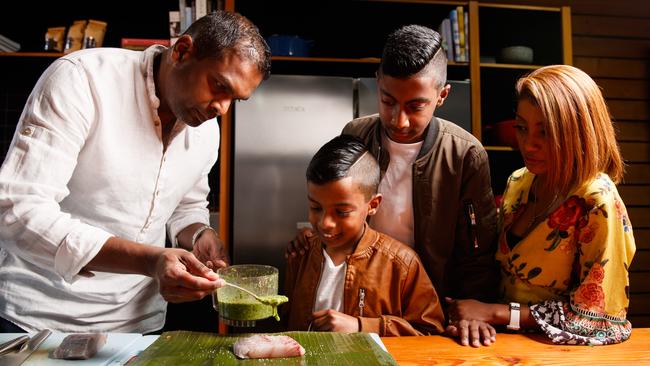 Sashi with his wife Rabicca and children Ryan, 10, and Marcus, 12, in the kitchen at Sprout. Picture: Matt Turner.