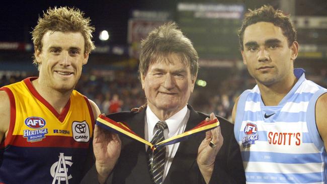 Joint Showdown Medal winners Simon Goodwin and Shaun Burgoyne with Geof Motley after the Showdown XVIII Heritage match at Football Park in 2005. 