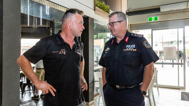 NT police commissioner Jamie Chalker talking with Wicked Kneads owner Darren Clark about crime in Alice Springs on Tuesday. Picture: EMMA MURRAY