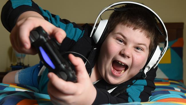 Alexis Kyriakopoulos, 10, managed to get ahold of a gaming console ahead of the school holidays. Picture: Josie Hayden