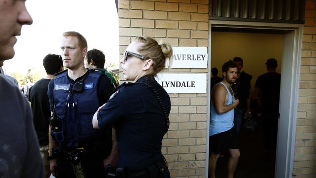 Police maintain a presence outside the Mt Waverley changerooms. Picture: Paul Loughnan