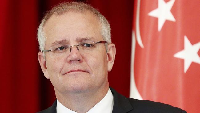 Prime Minister Scott Morrison has tried to distance his government from the raids. Picture: AP/Yong Teck Lim