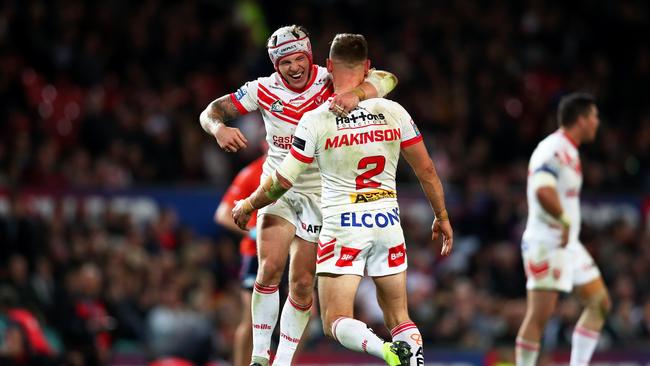 Tommy Makinson and Theo Fages celebrate the win. Picture: Clive Brunskill/Getty