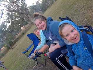 HOLIDAY TREAT: Ben, Amy and Isaac living it up in the cold outdoors. Picture: Andrew Gale