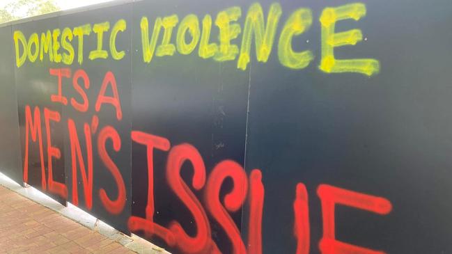 A temporary construction wall in Stirling has been graffitied with the messages "101 women killed in 2024" and "domestic violence is a men's issue". Picture: Supplied