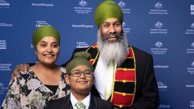 NSW Local Hero Amar Singh arrived with his wife Khajimder Kaur and son Bir Jujhar Singh. Picture: NCA NewsWire / Gary Ramage