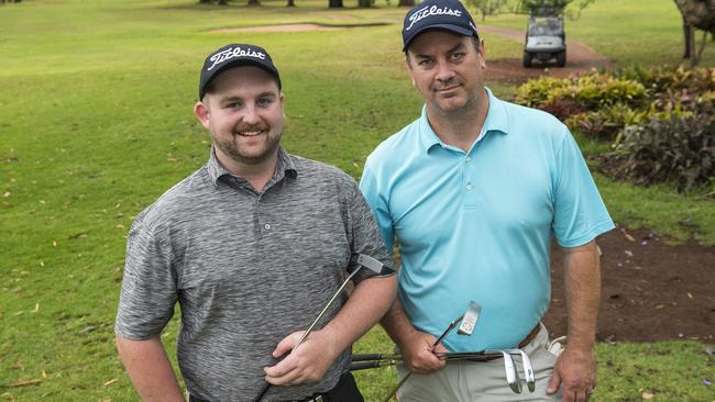 Mitchell Dunbar (left) and Toowoomba Golf Club general manager David Marr take a break during the 100-hole challenge in support of Cancer Council Queenslands The Longest Day campaign at Toowoomba Golf Club. Picture: Kevin Farmer