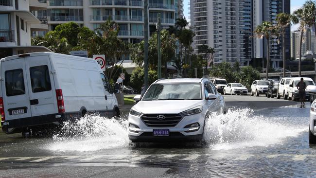 Flooding from the King tide at Budds Beach at Surfers Paradise was made worse by the approaching storm system. Picture Glenn Hampson
