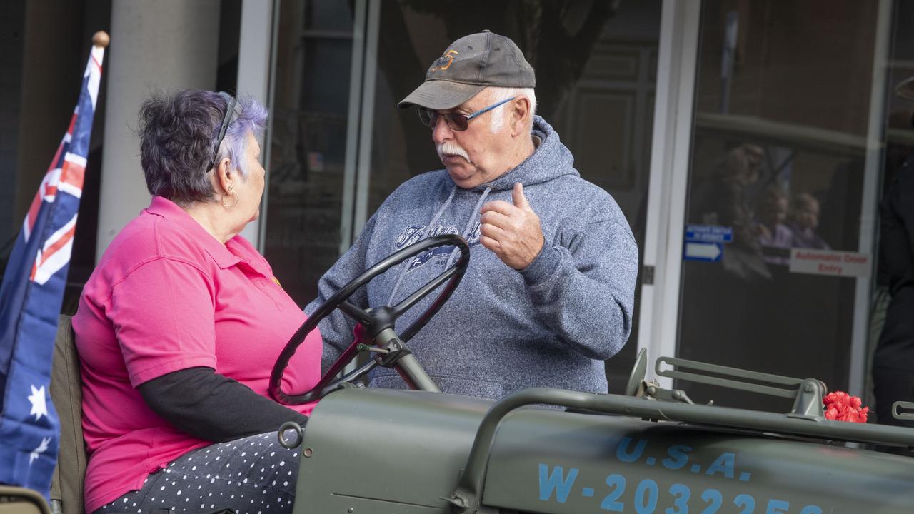 Anthea and Wayne Milburn with their 1941 Willys. Assembly in Neil St for the mid morning parade on ANZAC DAY. Tuesday, April 25, 2023. Picture: Nev Madsen.