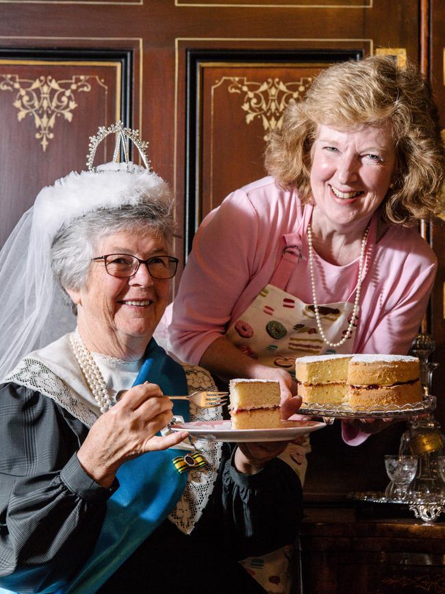 Joy Middleton dressed as Queen Victoria, and Melinda Wilkinson with her classic sponge cake promoting the Show at Ayers House in 2019. Picture: Morgan Sette