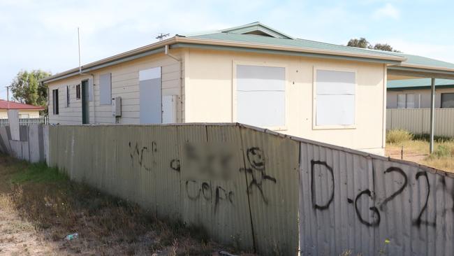 Graffiti reading f*** cops is seen on a residential fence. Picture Andrew Brooks