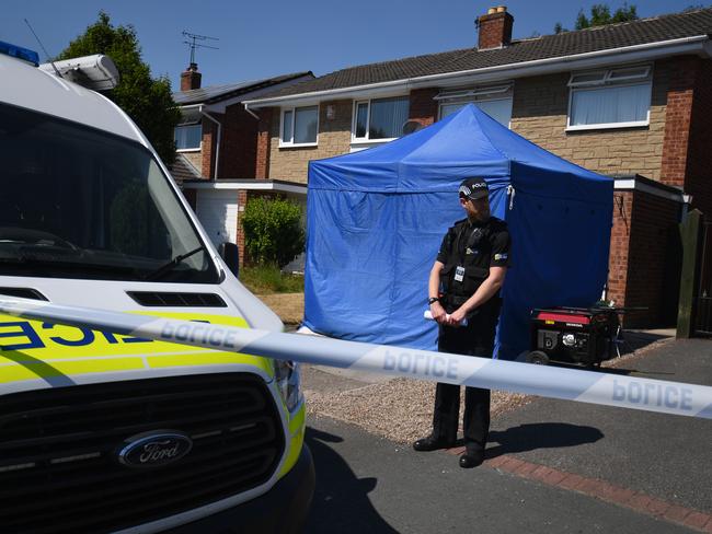 A police officer stands outside number a house in Chester after a healthcare professional working at the Countess of Chester Hospital was arrested on suspicion of murdering eight babies and attempting to kill six others, on July 3, 2018.