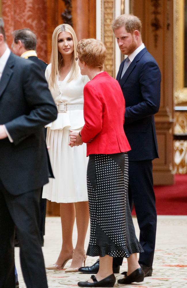 Ivanka Trump (centre), daughter of US President Donald Trump, and Britain's Prince Harry, Duke of Sussex, view displays of US items of the Royal Collection at Buckingham Palace. Picture: AFP