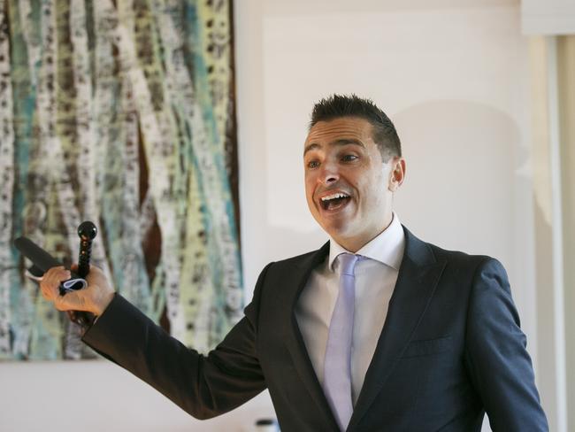 Auctioneer Vic Lorusso at an onsite auction on the northern beaches this month. Thirty-two properties are being auctioned this weekend, May 25.