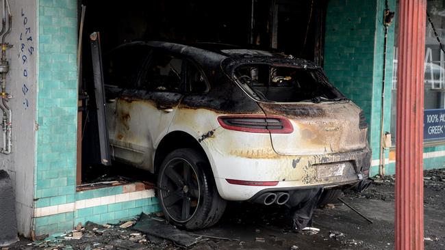 Police were called to a Bay Street hair salon in Port Melbourne just after 1.30am on Monday morning following reports a Porsche had crashed into a shop. Picture: Andrew Henshaw / NewsWire