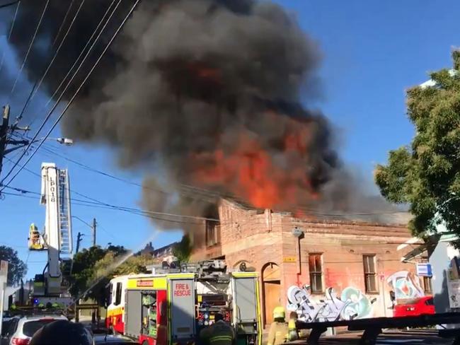 An old warehouse at 101 Australia St went up in flames on Sunday. Picture: Twitter @taylah_hill