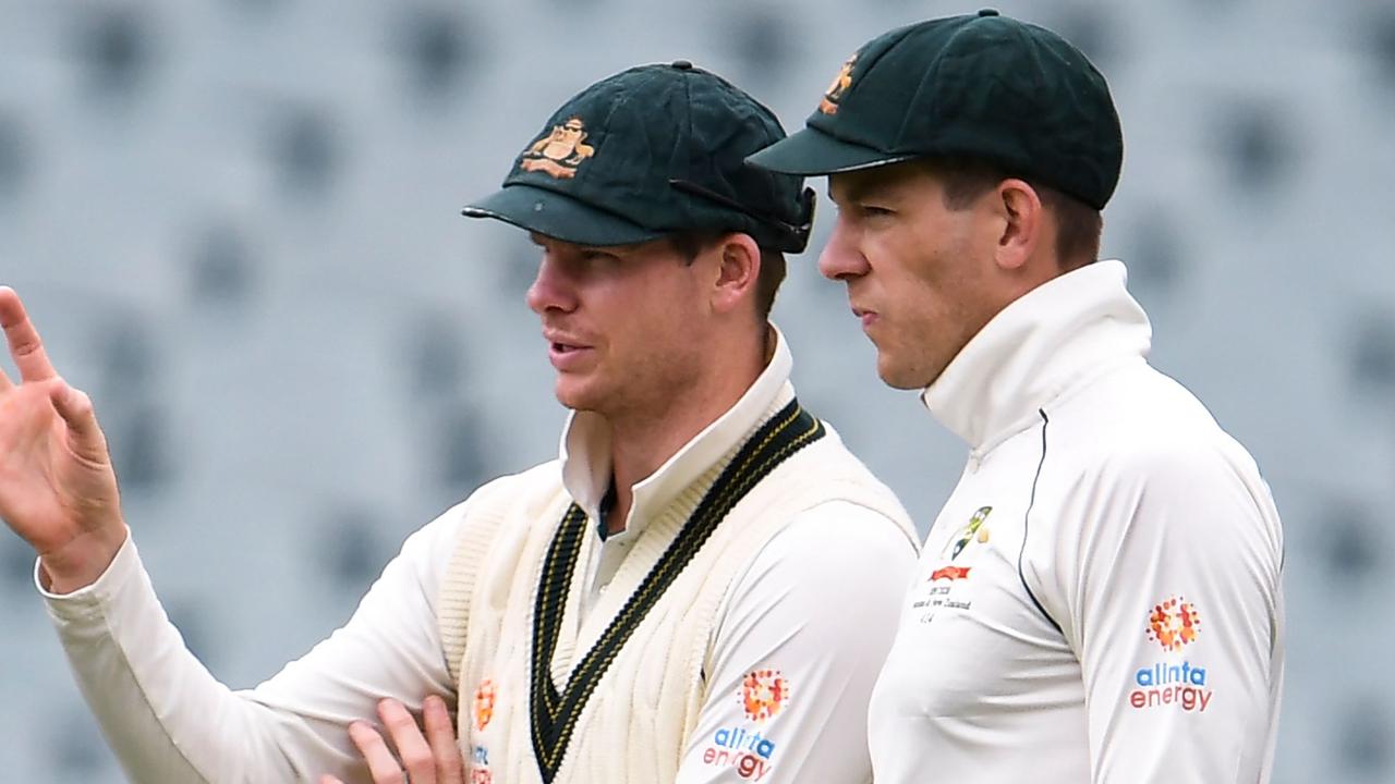 Australia's Steve Smith speaks with captain Tim Paine during the Adelaide Test.