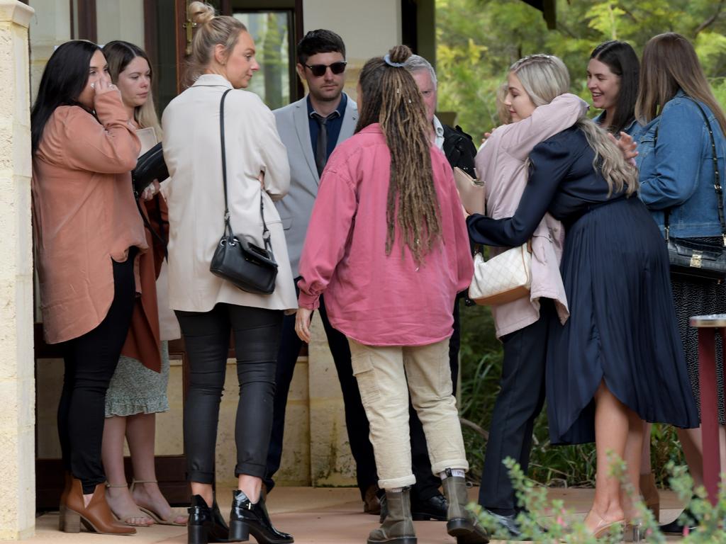 Family and mourners embraced after the service. Picture: NCA NewsWire / Sharon Smith