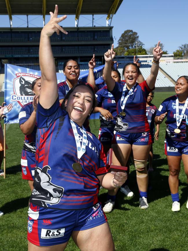 Alafou Fatu leads the Campbelltown Collegians victory celebrations. Picture: John Appleyard